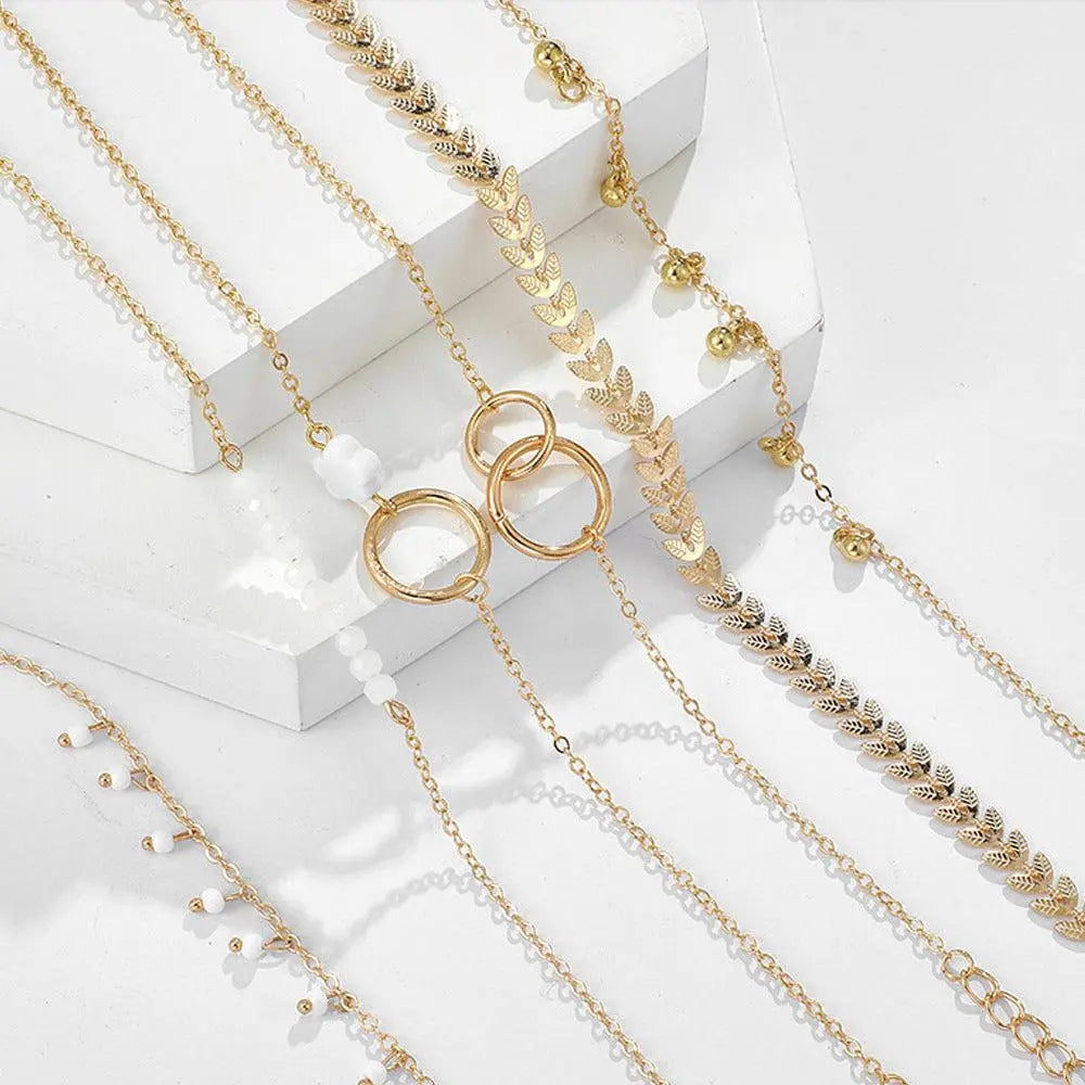 Gelaagde armbanden set in goudlook – elegante boho stijl